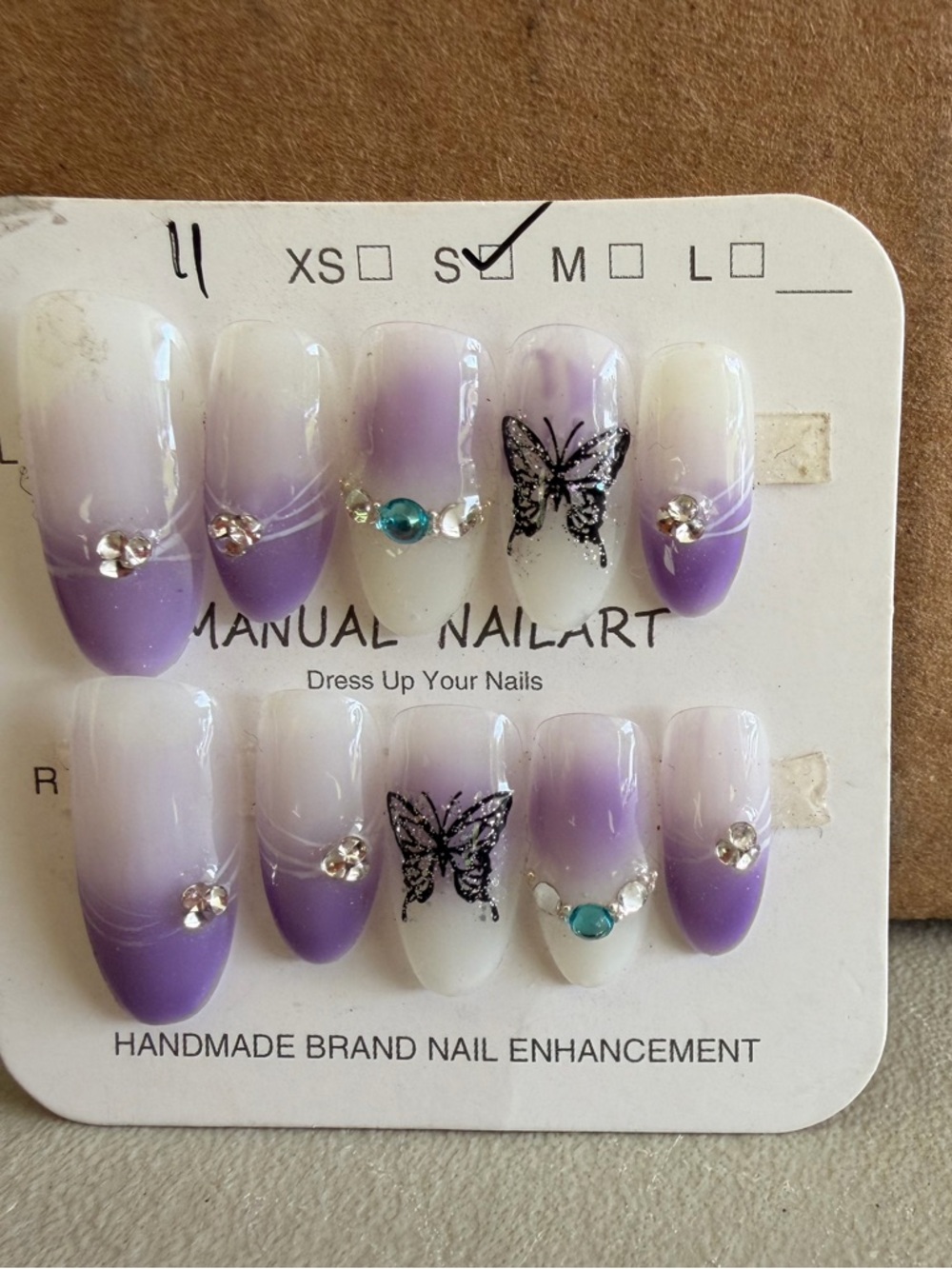White & purple ombré with rhinestones and butterfly press on nails 💅